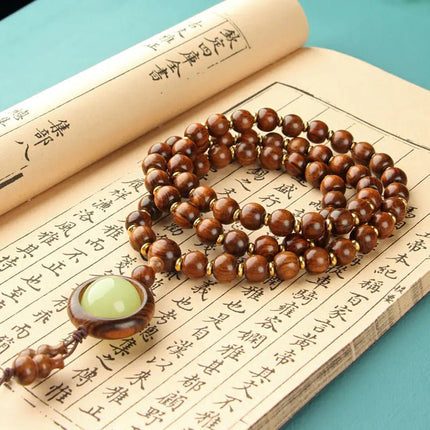 Natural Wood 108 Buddha Beads with Yellow Flower Pear